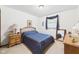 Comfortable bedroom featuring carpet floors, soft natural light, and charming traditional decor at 3824 Oakwood Blvd, Anderson, IN 46011