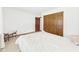 Bright bedroom featuring carpet floors, a window, and ample space at 3824 Oakwood Blvd, Anderson, IN 46011