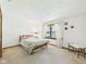 Spacious bedroom filled with natural light, featuring carpet floors and a comfortable atmosphere at 3824 Oakwood Blvd, Anderson, IN 46011