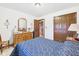 Cozy bedroom with carpet floors, wood trim, and a classic aesthetic at 3824 Oakwood Blvd, Anderson, IN 46011