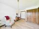 A well-lit living room features hardwood floors and neutral walls at 3824 Oakwood Blvd, Anderson, IN 46011