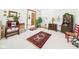 A spacious room with hardwood floors, vintage accents and view to the hallway at 3824 Oakwood Blvd, Anderson, IN 46011