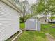 Backyard features a shed and partial fence at 411 Mccullen St, Chesterfield, IN 46017