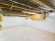 Unfinished basement space, ready to be transformed with exposed ceiling at 411 Mccullen St, Chesterfield, IN 46017