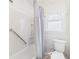 Bright bathroom featuring a shower and window for natural light at 411 Mccullen St, Chesterfield, IN 46017