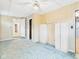 Spacious bedroom with carpet floors and a built in cabinets at 411 Mccullen St, Chesterfield, IN 46017