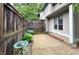 Sideyard view showing a concrete area and perimeter fence at 4212 Foxglove Trce, Indianapolis, IN 46237