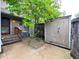 Private backyard with storage shed, small patio, and green space, great for outdoor activities at 4212 Foxglove Trce, Indianapolis, IN 46237