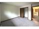 Comfortable bedroom featuring a closet and carpeted floors at 4212 Foxglove Trce, Indianapolis, IN 46237