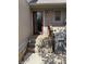 Cozy front entrance featuring a red door, steps and a small window for natural light at 4212 Foxglove Trce, Indianapolis, IN 46237