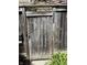 Wooden gate showcasing the house number, ensuring easy identification and secure entry at 4212 Foxglove Trce, Indianapolis, IN 46237