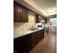 Modern kitchen with marble countertops, stainless steel appliances, and tile backsplash at 4212 Foxglove Trce, Indianapolis, IN 46237