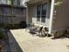Relaxing patio setup with a small dining table and chairs at 4212 Foxglove Trce, Indianapolis, IN 46237
