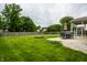 Expansive backyard featuring a large patio with outdoor seating and a well-maintained lawn at 4227 Short Ter, Carmel, IN 46033