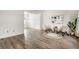 Open-concept living room featuring neutral colors, modern flooring, and minimalist decor for a spacious feel at 4227 Short Ter, Carmel, IN 46033