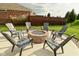 Cozy backyard fire pit surrounded by seating, great for enjoying evenings outdoors at 4396 Nigella Dr, Plainfield, IN 46168