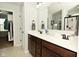 Bathroom featuring and sinks and dark wood cabinets at 4396 Nigella Dr, Plainfield, IN 46168