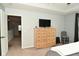 Bedroom with dresser, tv, chair, and walk-in closet at 4396 Nigella Dr, Plainfield, IN 46168