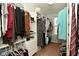 Walk in closet with custom shelving providing plenty of storage space at 4396 Nigella Dr, Plainfield, IN 46168