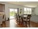 Hardwood floors, large sliding door, and a view to the living room at 4396 Nigella Dr, Plainfield, IN 46168