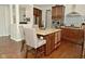 Spacious kitchen with a large island, stainless steel appliances, and wooden cabinets at 4396 Nigella Dr, Plainfield, IN 46168