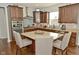 Well-equipped kitchen featuring stainless steel appliances and a kitchen island with seating at 4396 Nigella Dr, Plainfield, IN 46168