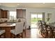 Modern kitchen with stainless steel appliances, granite countertops, and wood cabinets at 4396 Nigella Dr, Plainfield, IN 46168