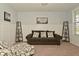 Welcoming living room with cozy seating, stylish decor, wainscoting and shelves creating a comfortable and inviting space at 4396 Nigella Dr, Plainfield, IN 46168