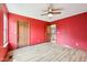 Bedroom featuring a window, door and hardwood floors at 5 Statesman Ct, Brownsburg, IN 46112