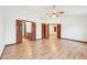 Bright main bedroom featuring hardwood floors and entry to ensuite bathroom at 5 Statesman Ct, Brownsburg, IN 46112