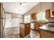 Bright eat-in kitchen with a center island, stainless steel appliances, and neutral countertops at 5204 Whipple Wood Ct, Indianapolis, IN 46226