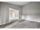Spacious living room featuring neutral walls and plush carpeting at 5204 Whipple Wood Ct, Indianapolis, IN 46226