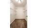 A well-organized walk-in closet with metal shelving and neutral carpeting provides ample storage space at 5204 Whipple Wood Ct, Indianapolis, IN 46226