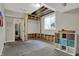 Unfinished basement with an egress window and a doorway to another room for lots of flexibility at 5386 W 1100 N, Fountaintown, IN 46130