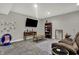 Relaxing Gathering room with neutral paint, recessed lights, stylish decor, and plenty of space for entertaining at 5386 W 1100 N, Fountaintown, IN 46130