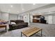 Cozy living room features neutral paint, recessed lighting, and comfortable seating for relaxing and watching TV at 5386 W 1100 N, Fountaintown, IN 46130