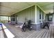 Inviting outdoor porch featuring a stylish design, comfortable seating, and ample space for relaxation at 5386 W 1100 N, Fountaintown, IN 46130