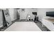 Finished basement area with a treadmill and stationary bicycle at 548 Lockerbie N Cir, Indianapolis, IN 46202