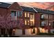 Beautiful brick townhomes featuring private garages and manicured landscaping at 548 Lockerbie N Cir, Indianapolis, IN 46202