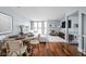 Bright and spacious living room with hardwood floors, a comfortable sofa, and plenty of natural light at 548 Lockerbie N Cir, Indianapolis, IN 46202