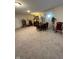 Open basement featuring a dining table, bookcase, and ample space for entertaining at 5601 Harness Dr, Greenwood, IN 46143