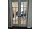 Office space with french doors, desk and bookshelves providing a quiet and functional work environment at 5601 Harness Dr, Greenwood, IN 46143