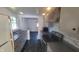 Kitchen with stainless steel appliances and black and gray countertops at 5831 Aho Dr, Avon, IN 46123
