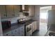 Updated kitchen with stainless steel appliances and gray countertops at 5831 Aho Dr, Avon, IN 46123