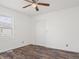 Inviting bedroom with a ceiling fan, a closet, and luxury vinyl flooring at 600 S Vine St, Muncie, IN 47302