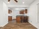 Bright kitchen featuring stylish wood cabinets and a breakfast bar with seating at 600 S Vine St, Muncie, IN 47302