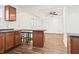 Open concept living space with adjacent modern kitchen and dining area at 600 S Vine St, Muncie, IN 47302