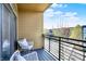 Relax on your private balcony, complete with chairs, overlooking the neighborhood at 622 E 10Th St # 312, Indianapolis, IN 46202