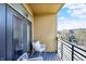 Spacious balcony with comfortable seating, perfect for enjoying views of the neighborhood at 622 E 10Th St # 312, Indianapolis, IN 46202