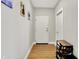 Inviting entryway with hardwood floors, a shoe rack, and neutral paint colors at 622 E 10Th St # 312, Indianapolis, IN 46202